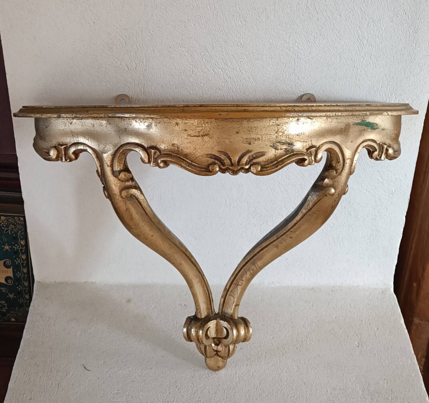 Golden wall console