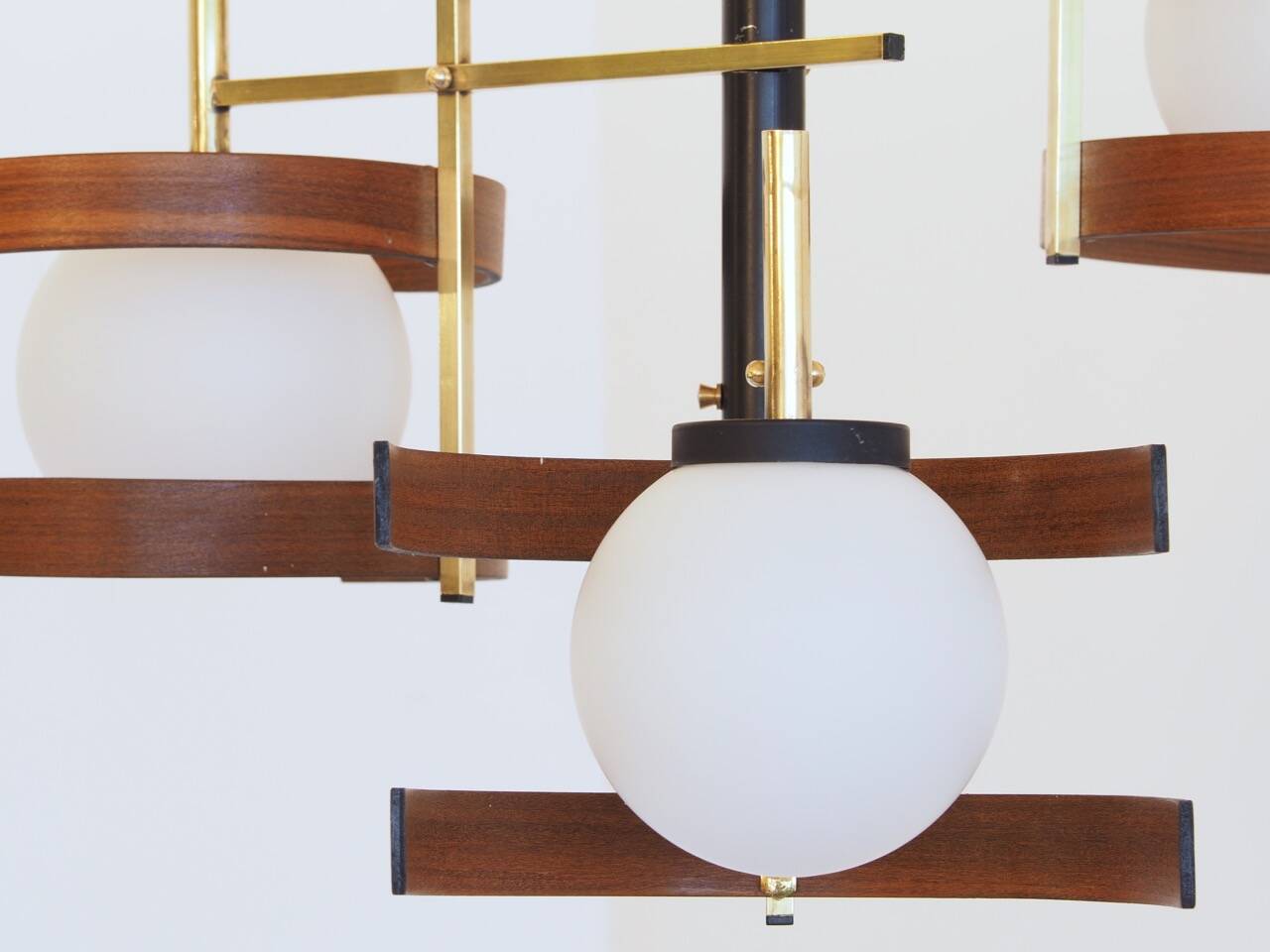 Italian 3-globe pendant light in opaline with teak and brass.