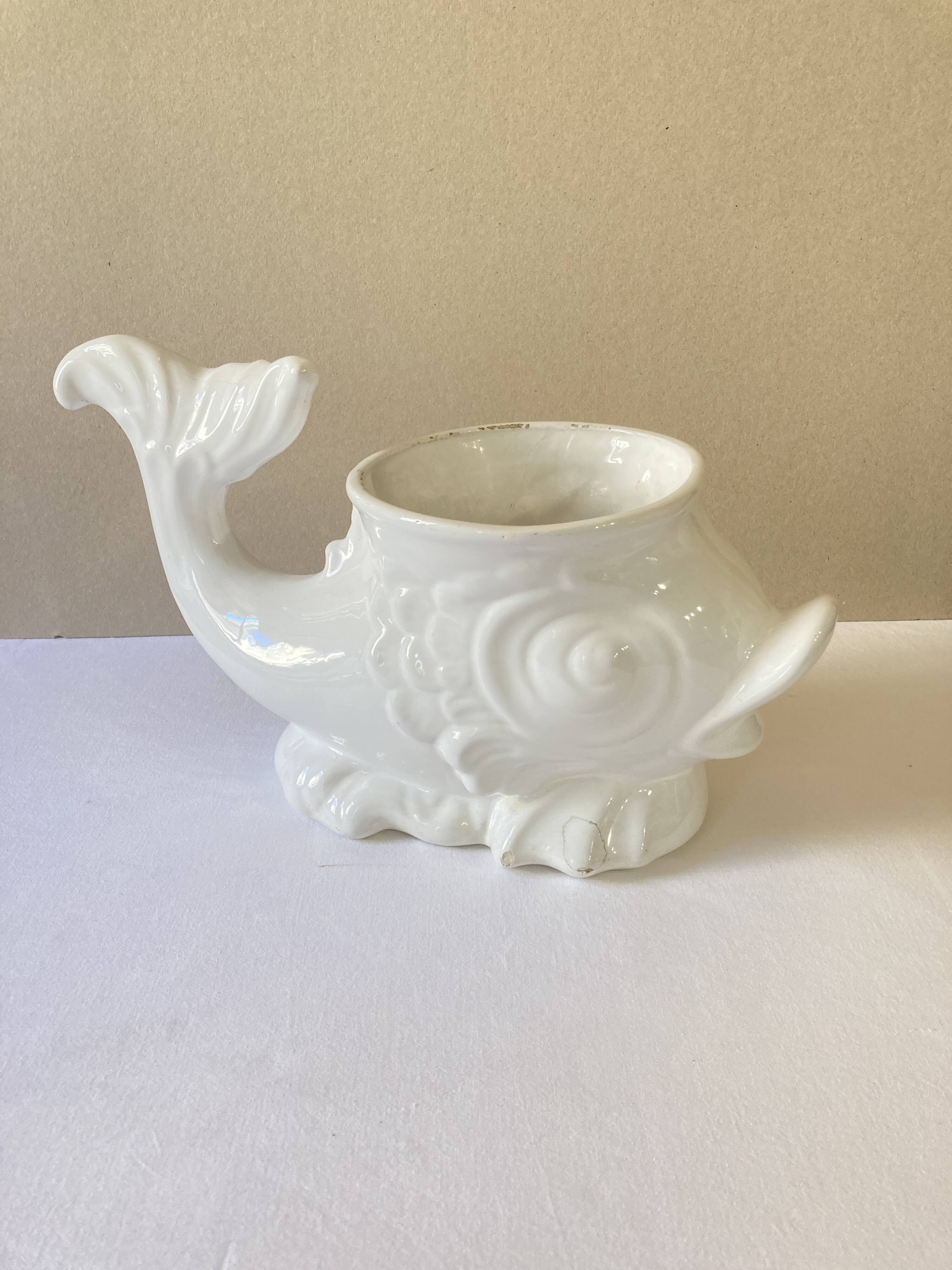 White ceramic fish plant pot