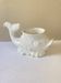 White ceramic fish plant pot