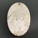 Character on plaster medallion