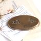 Signed bronze paperweight, 1993