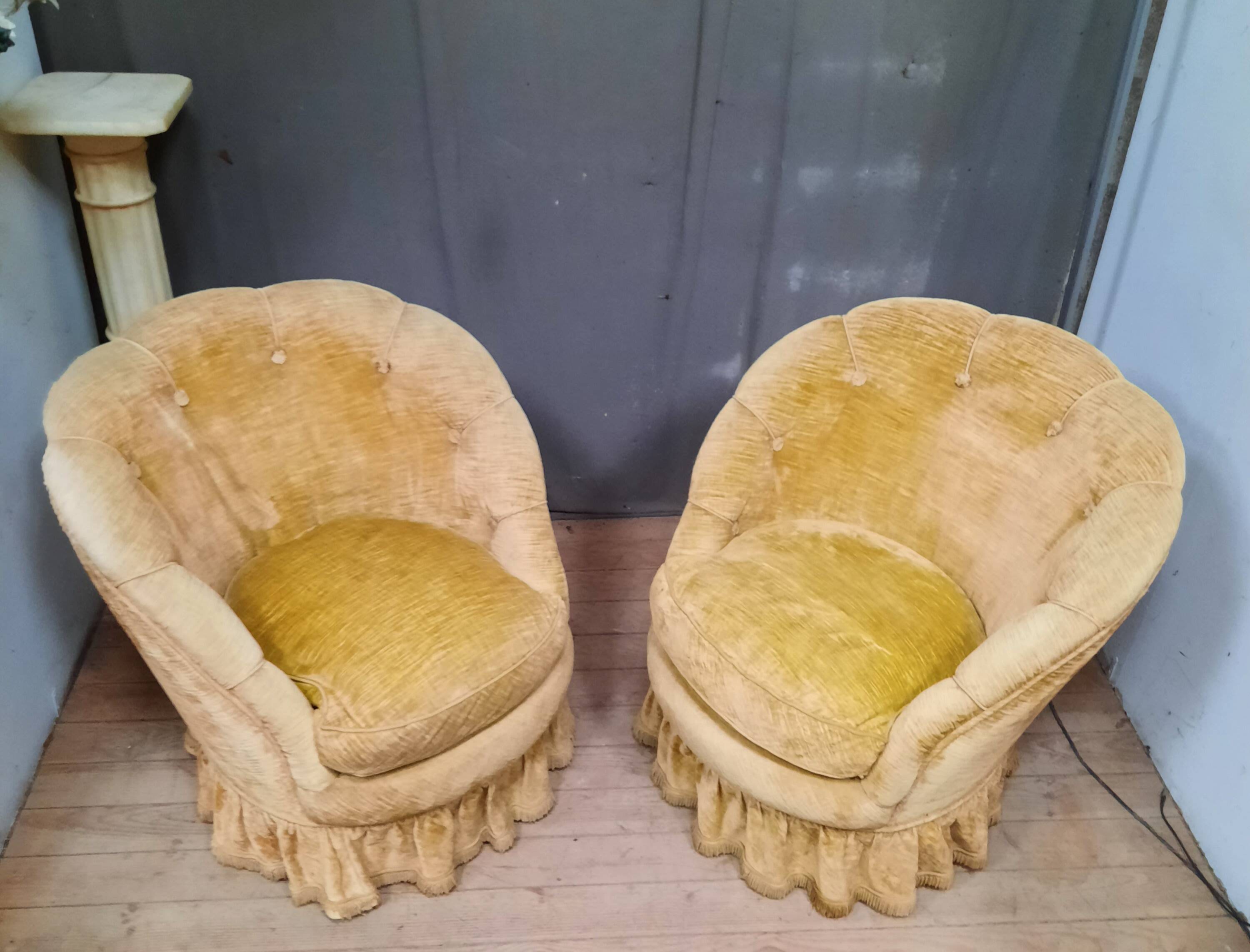 Pair of flared back toad armchairs