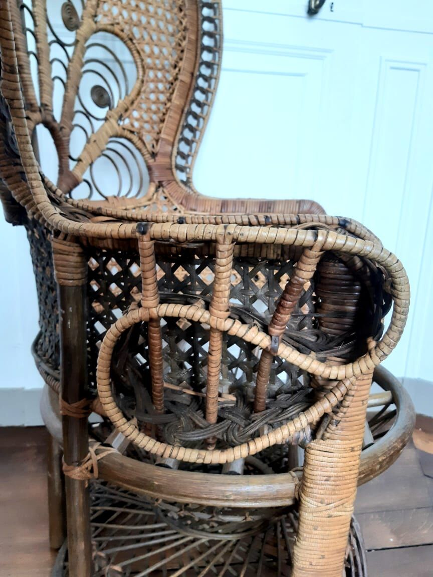 Peacock rattan armchair, circa 1960