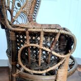Peacock rattan armchair, circa 1960