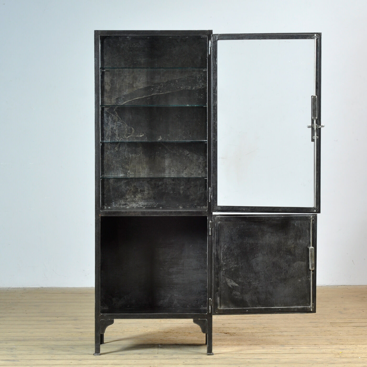 Polished iron medical cabinet, 1930s