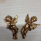 Set of two plaster cherubs gilded with fine gold