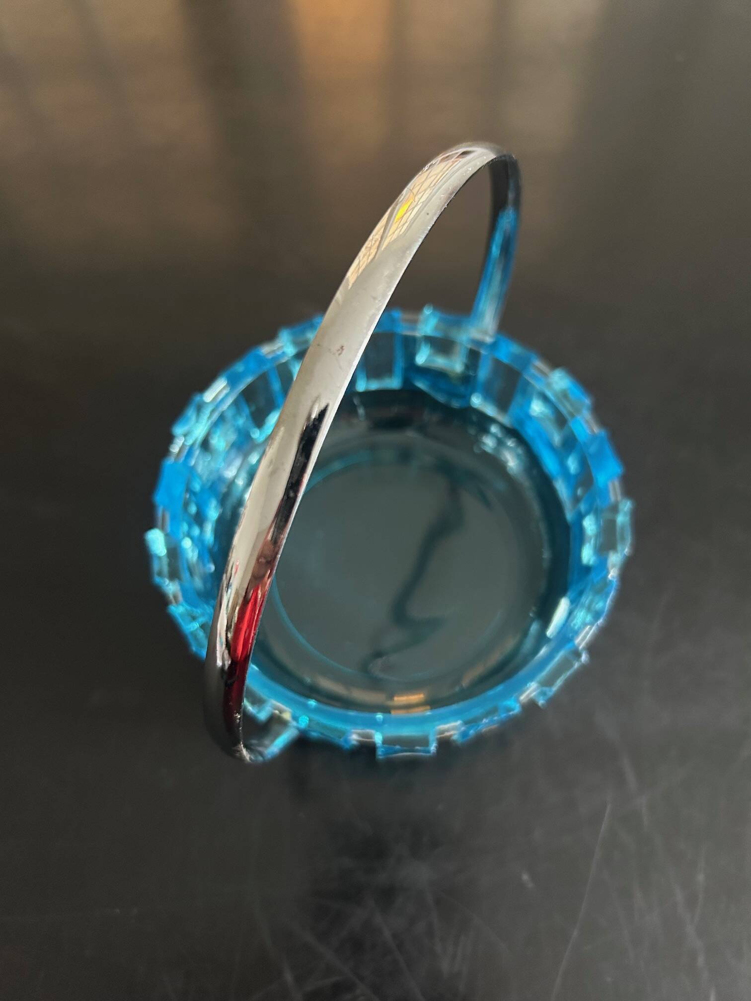 glass and hammered metal pocket emptier