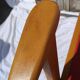 Pair of wooden armchairs and skaï foot compass of the 50s