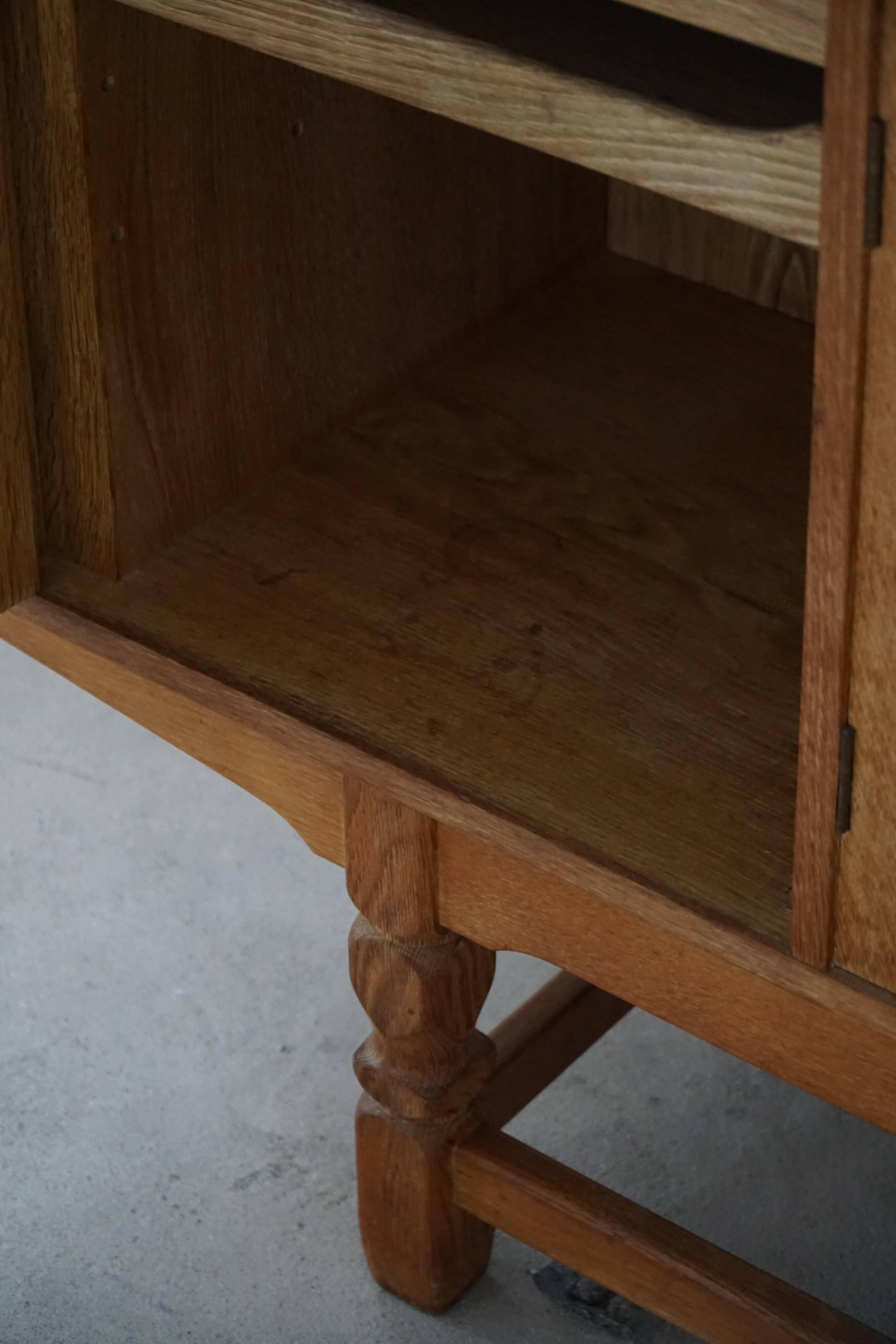Low oak sideboard, mid-century modern, made by a Danish cabinetmaker, 1960s.