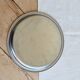 Vintage round metal plate with silver trim and beads.