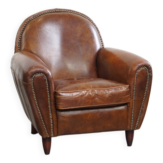 Fauteuil en cuir de vache marron