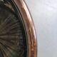 Vintage rattan coffee table with smoked glass top and rattan basket shelf
