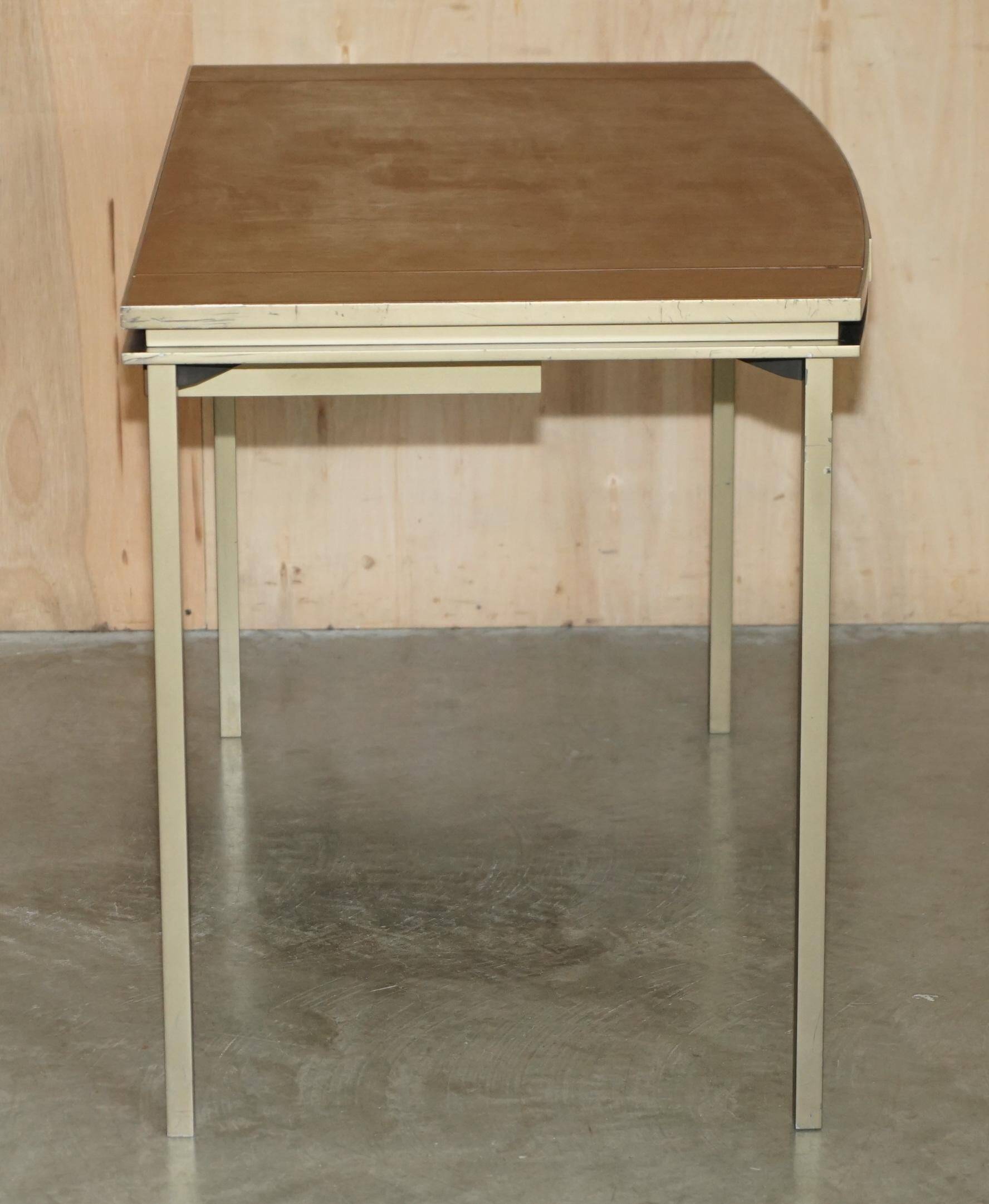 Modern mid-century writing desk signed Cartier in bronze and leather.