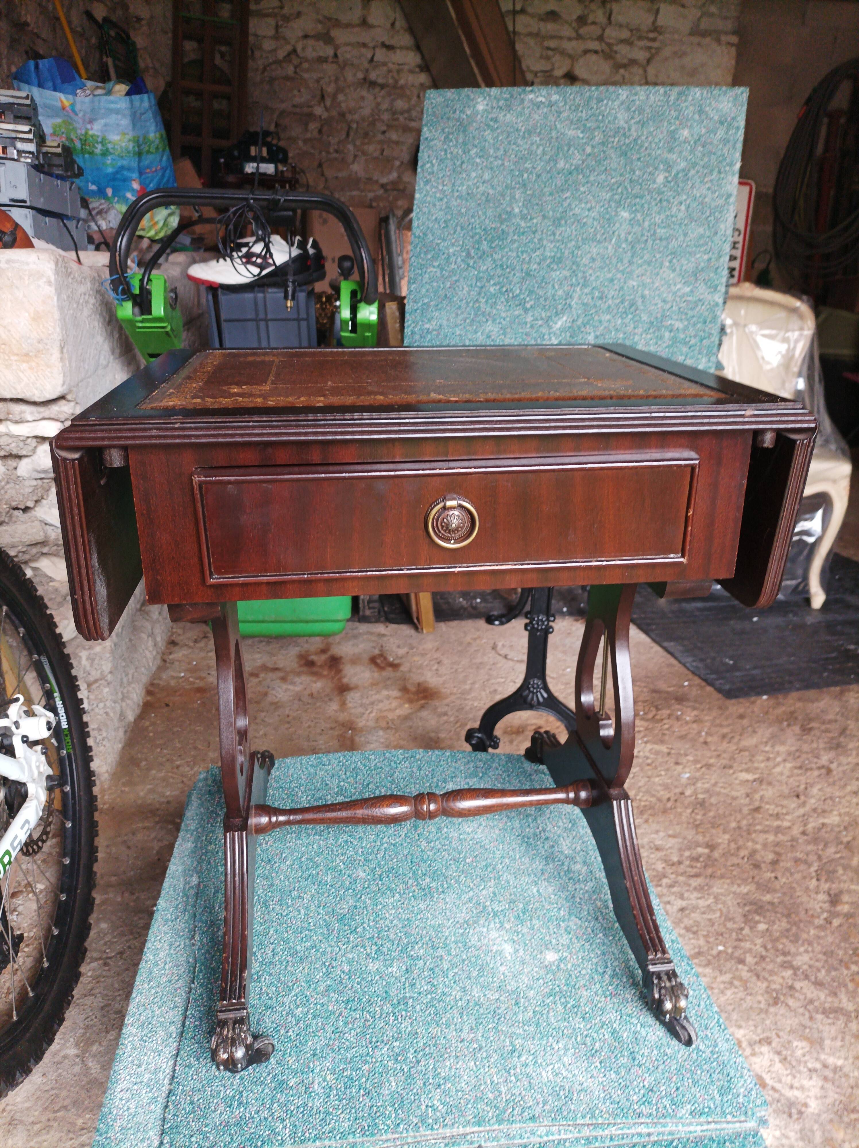 Folding table with a leather top