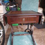 Folding table with a leather top