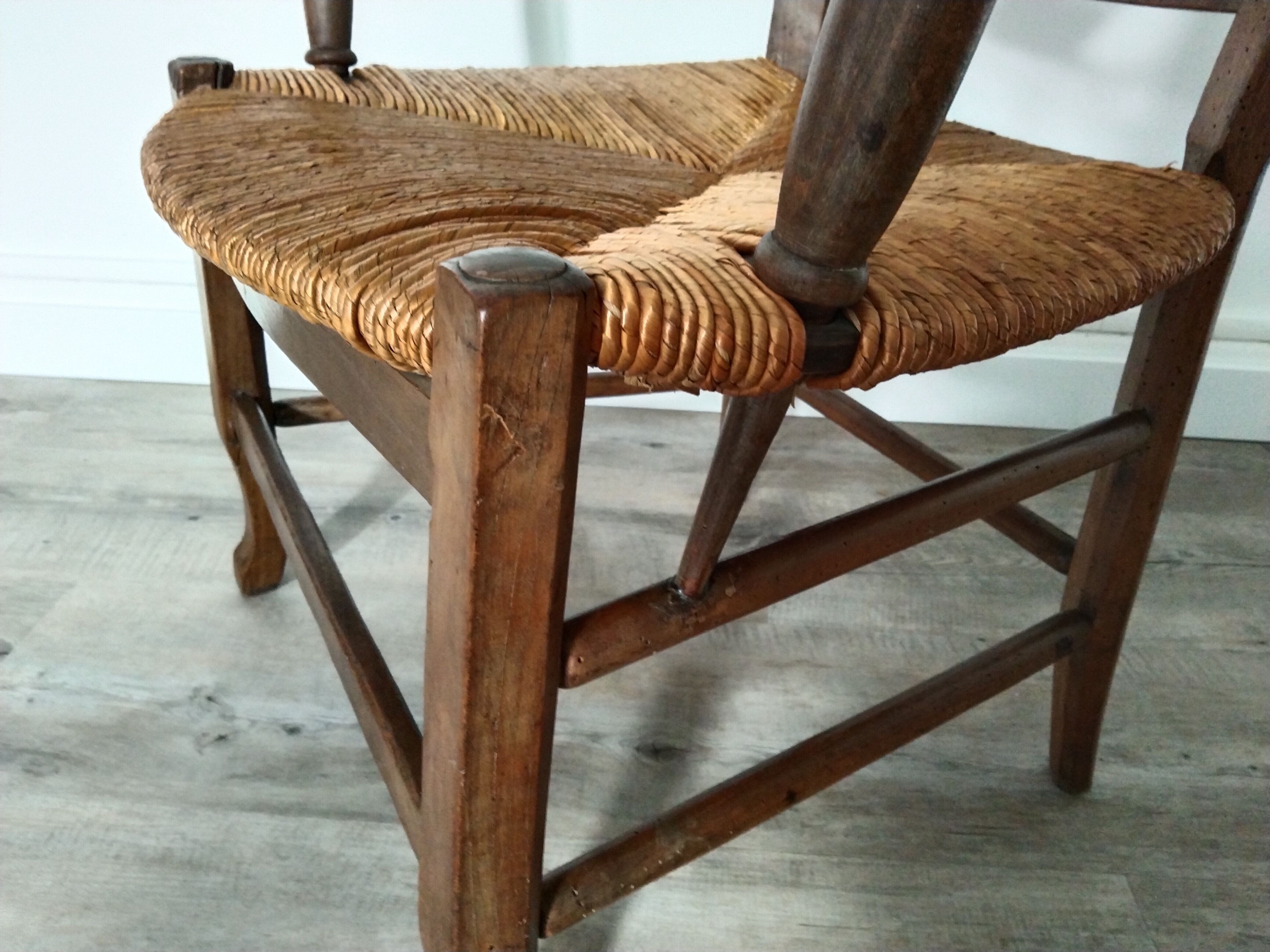 Straw armchair folk art.