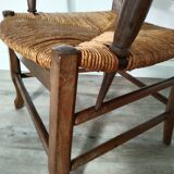 Straw armchair folk art.