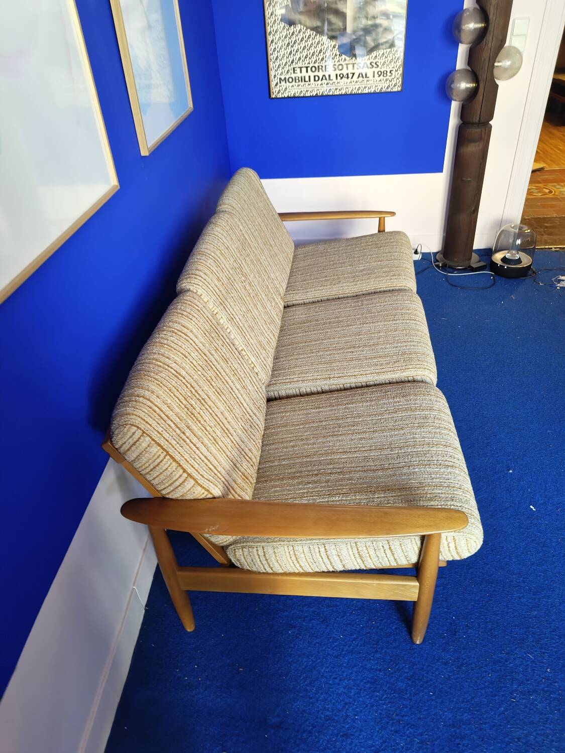 Scandinavian sofa in wood and vintage fabric from the 60s