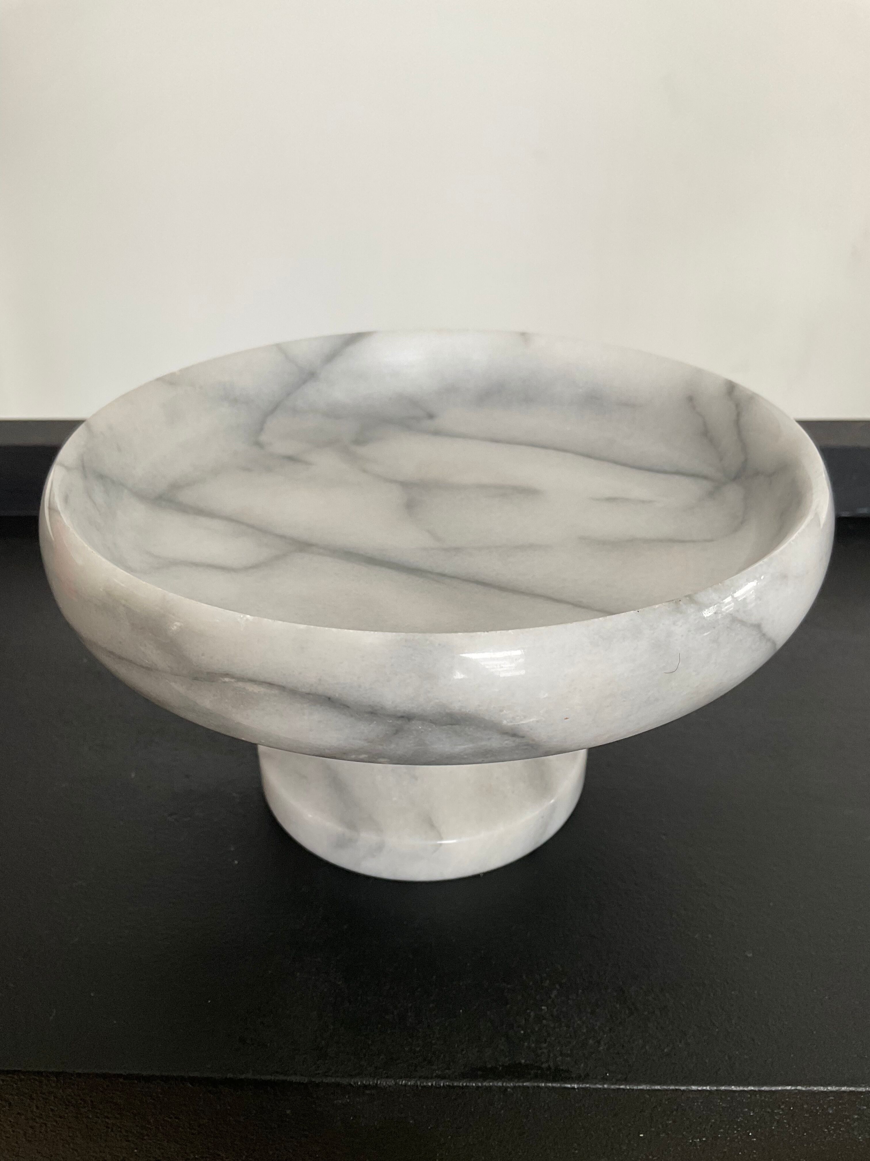 Empty pocket on vintage stand in white marble 70s