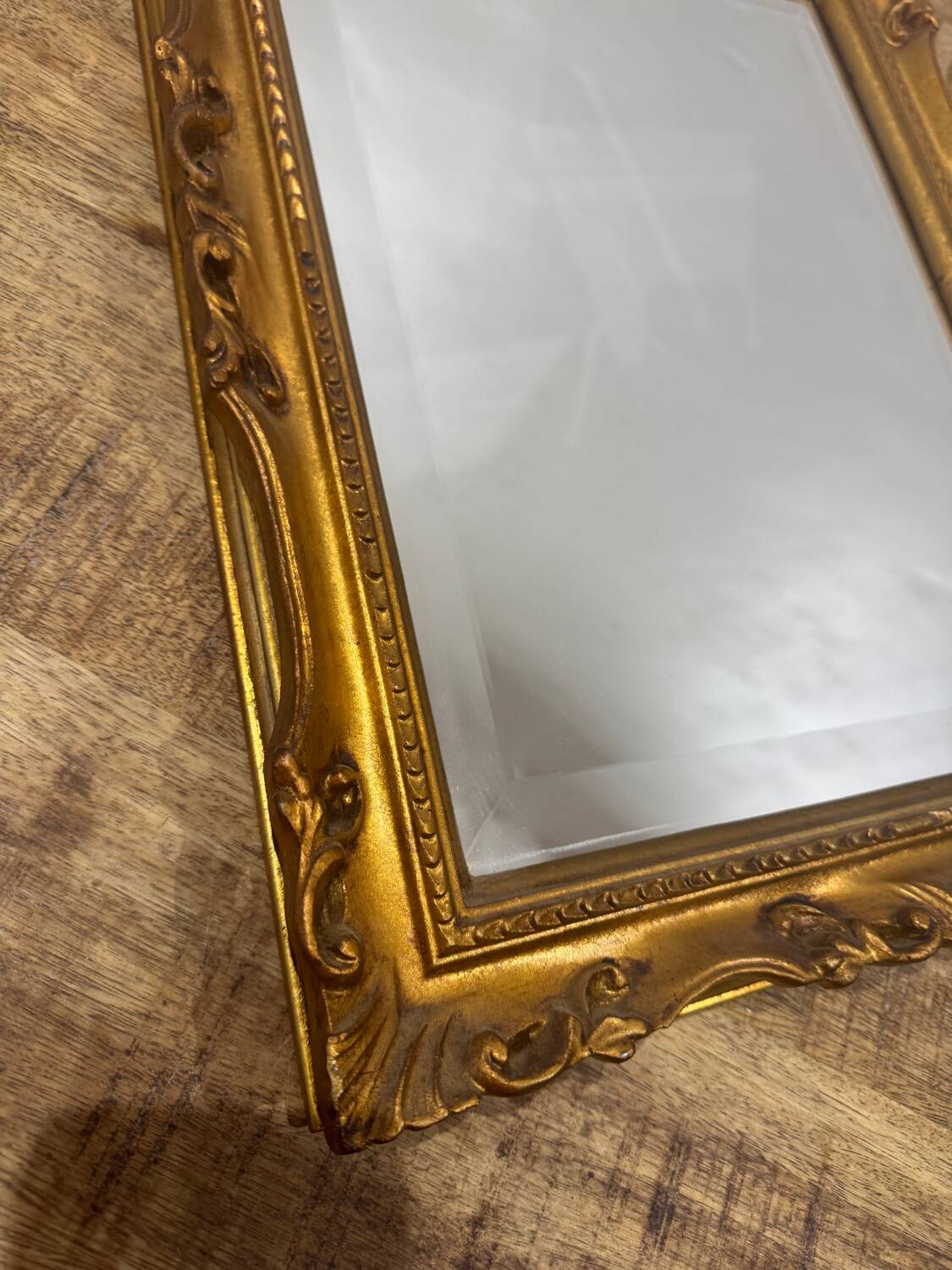 Beveled gold mirror