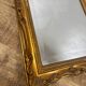 Miroir doré biseauté