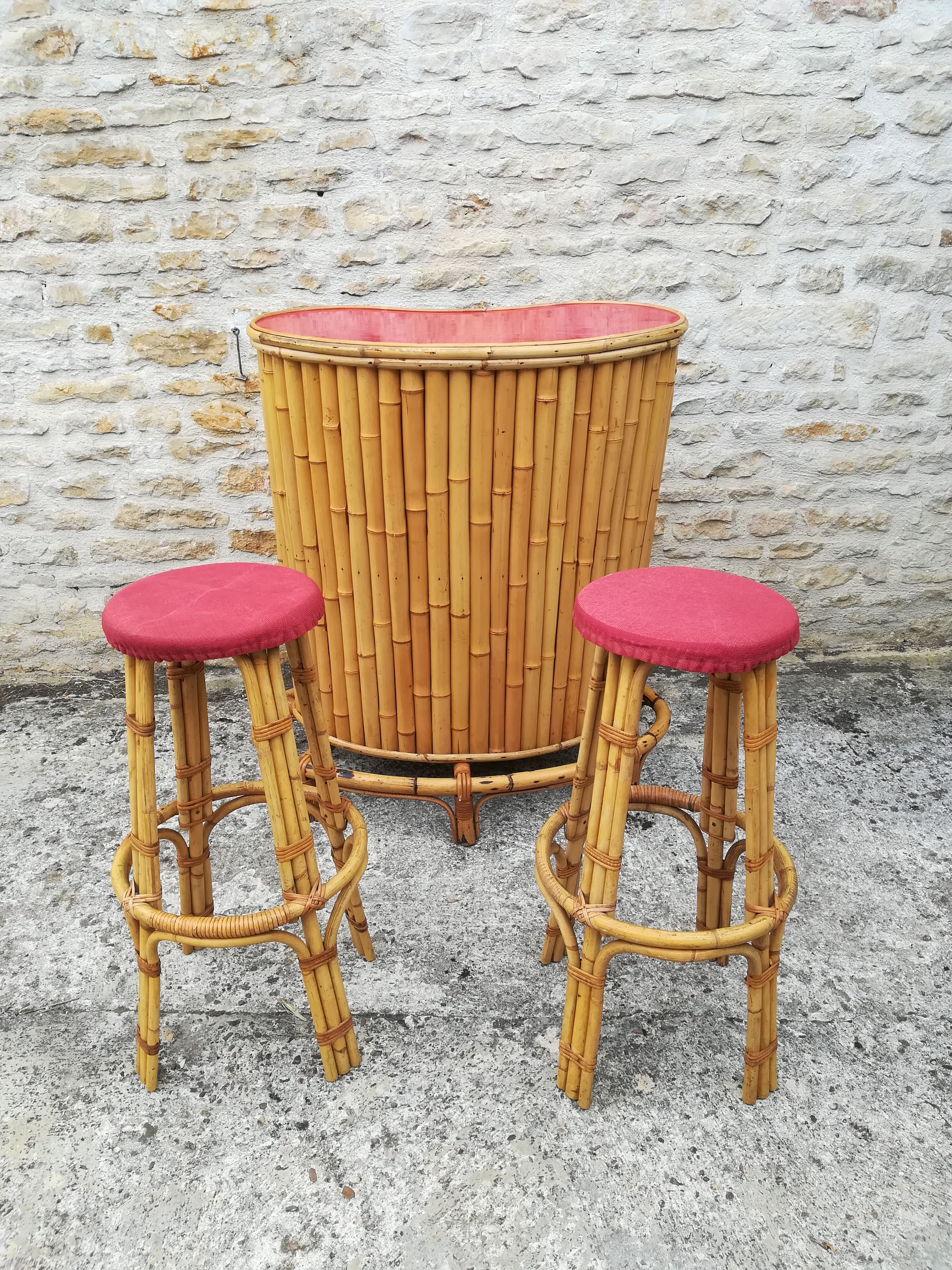Bamboo tiki bar and two stools