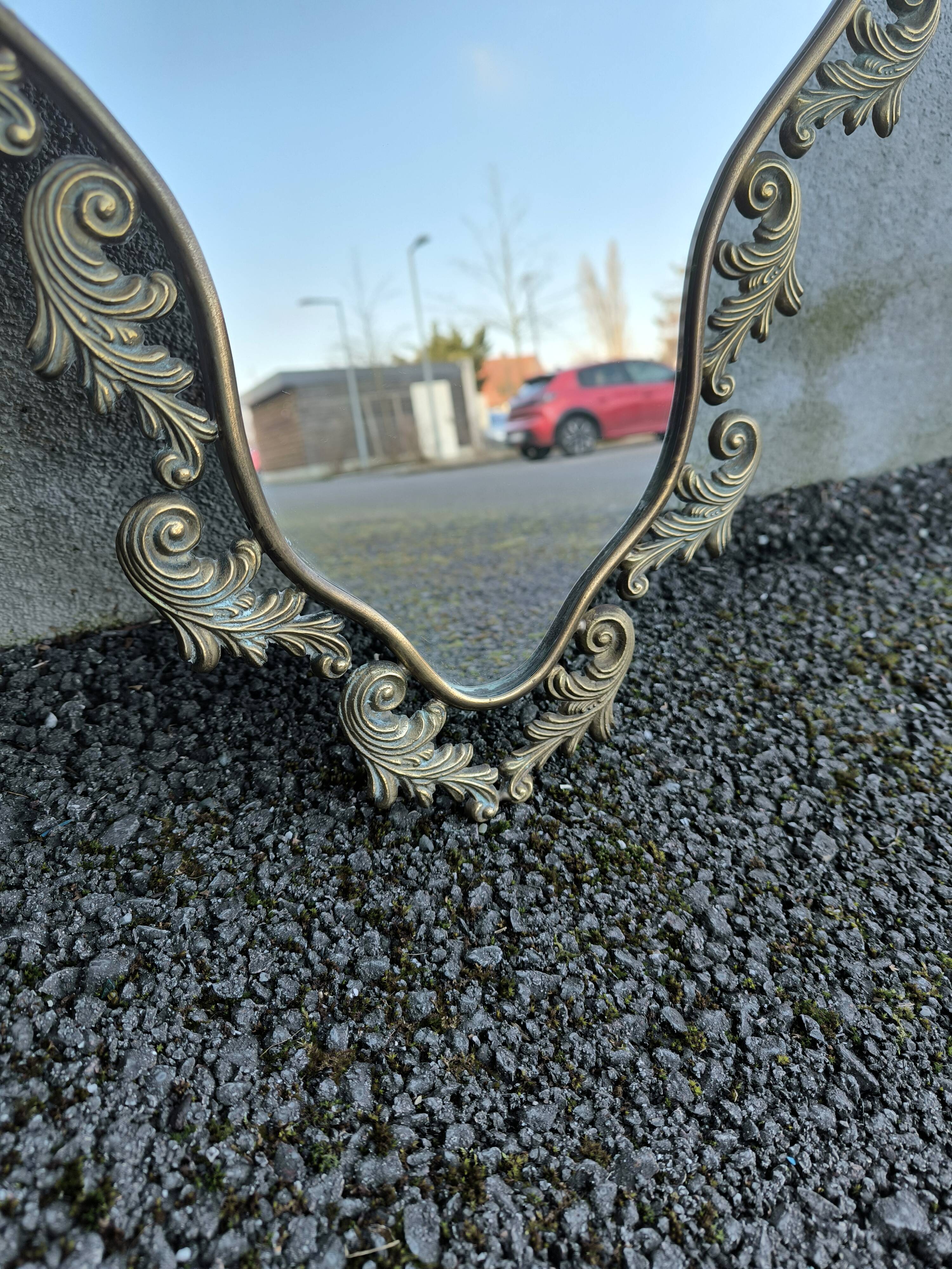 Antique brass mirror