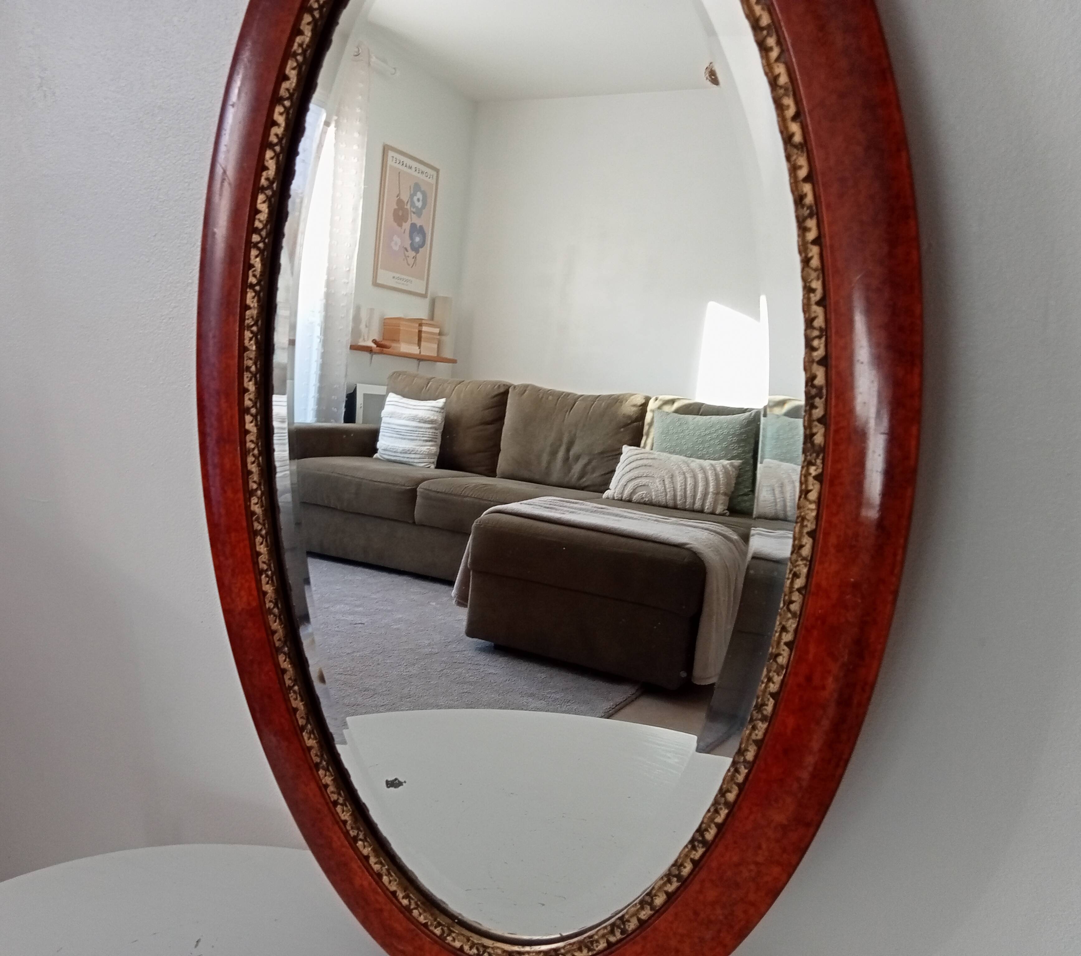 Antique oval mirror with bevelled glass