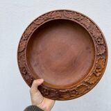 Carved wooden pocket emptier