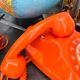 Orange vintage dial phone