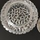 Round ceiling or wall lamp in worked glass. Gray metal support