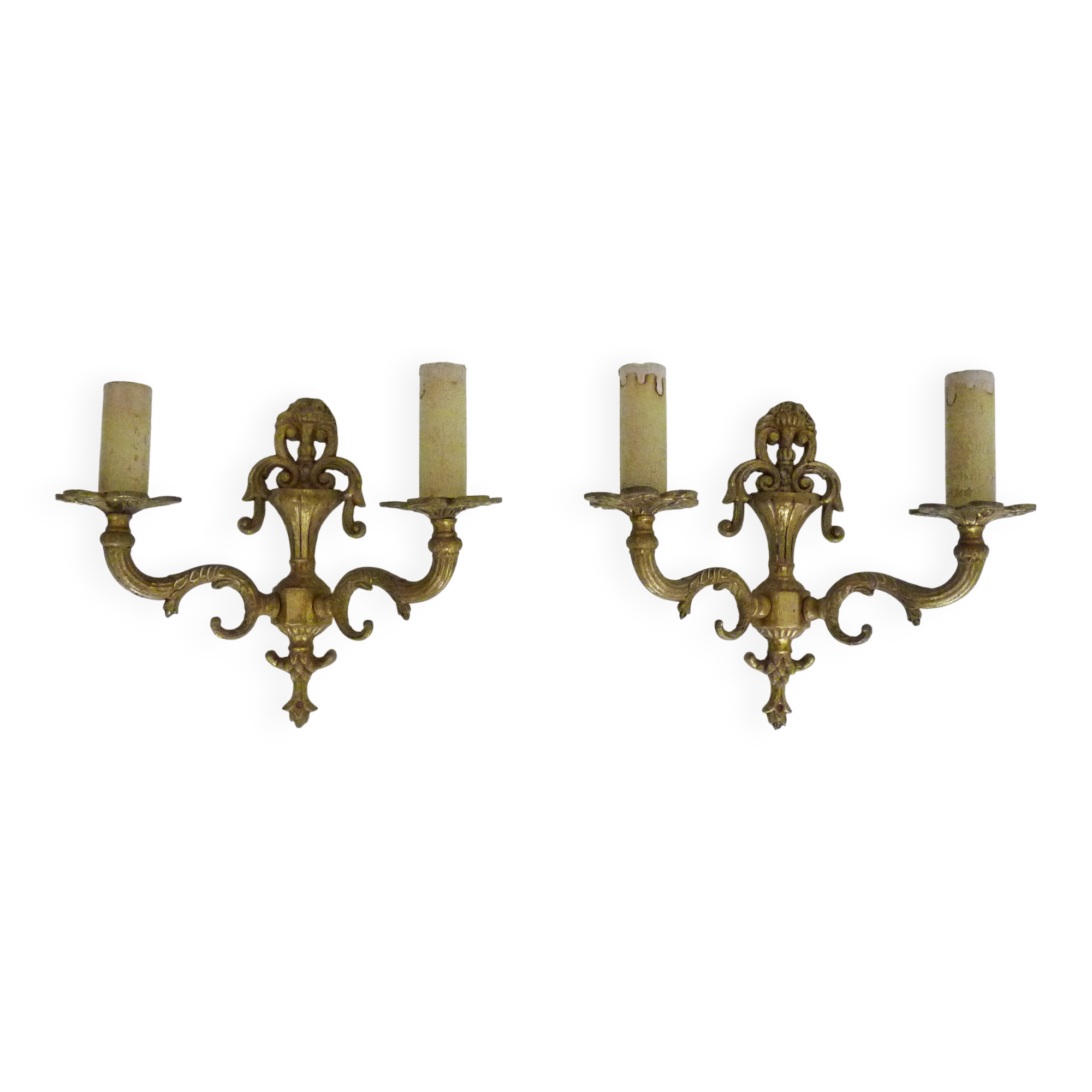 Pair of two-armed fire pot wall lights in gilded bronze.