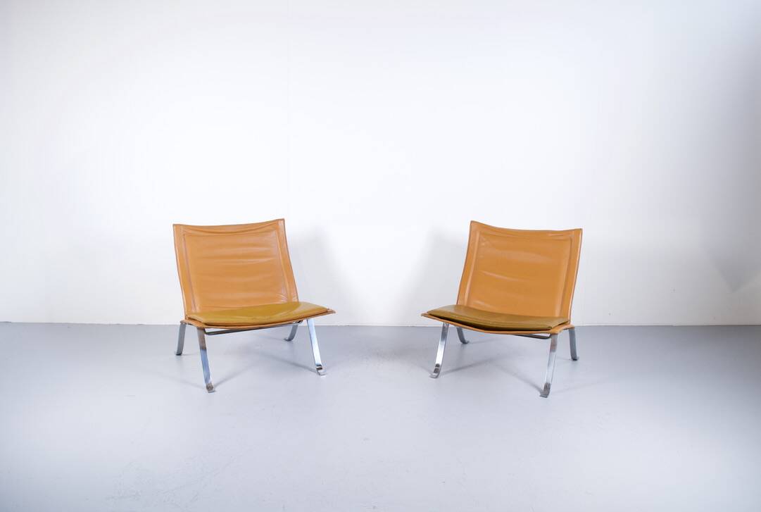 Imposing pair of leather and steel armchairs from the 1960s