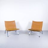 Imposante paire de fauteuils cuir et acier années 60'