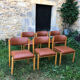 Six wooden and leatherette chairs