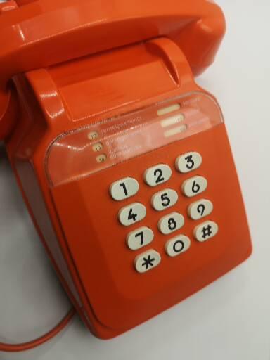 Vintage bakelite orange phone