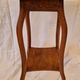 Antique Art Nouveau pedestal table with carved wood and marble top.
