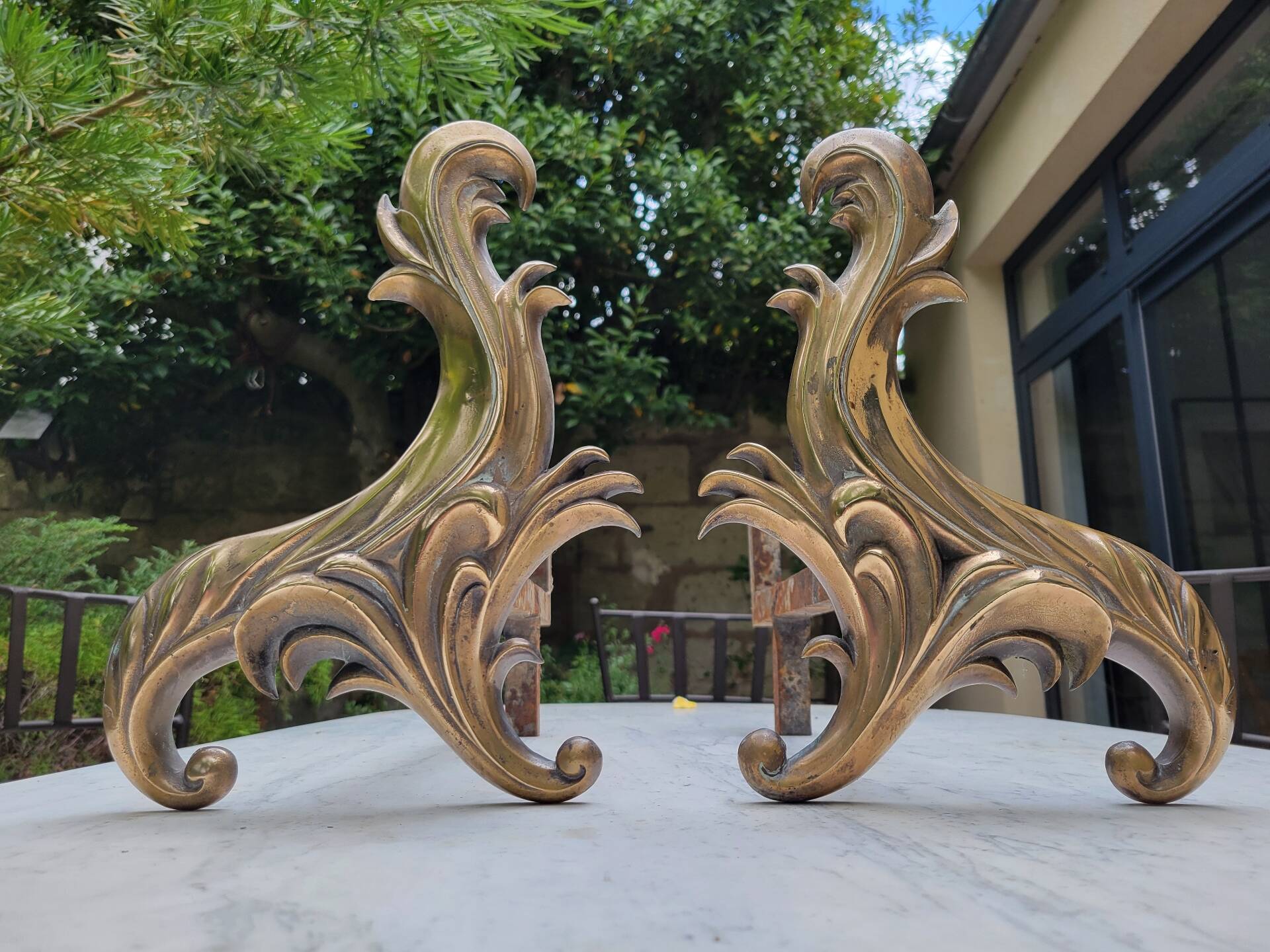Gilded bronze chenets from the 19th century