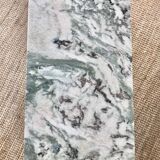 Coffee table in brass and green marble