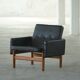 Oak and leather armchair, created by Jørgen Bækmark for FDB Møbler, Denmark, 1960s.