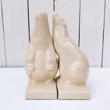 Cracked ceramic bookends with a couple of bears
