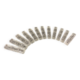 Set of 12 molded glass or crystal knife rests with diamond point decor