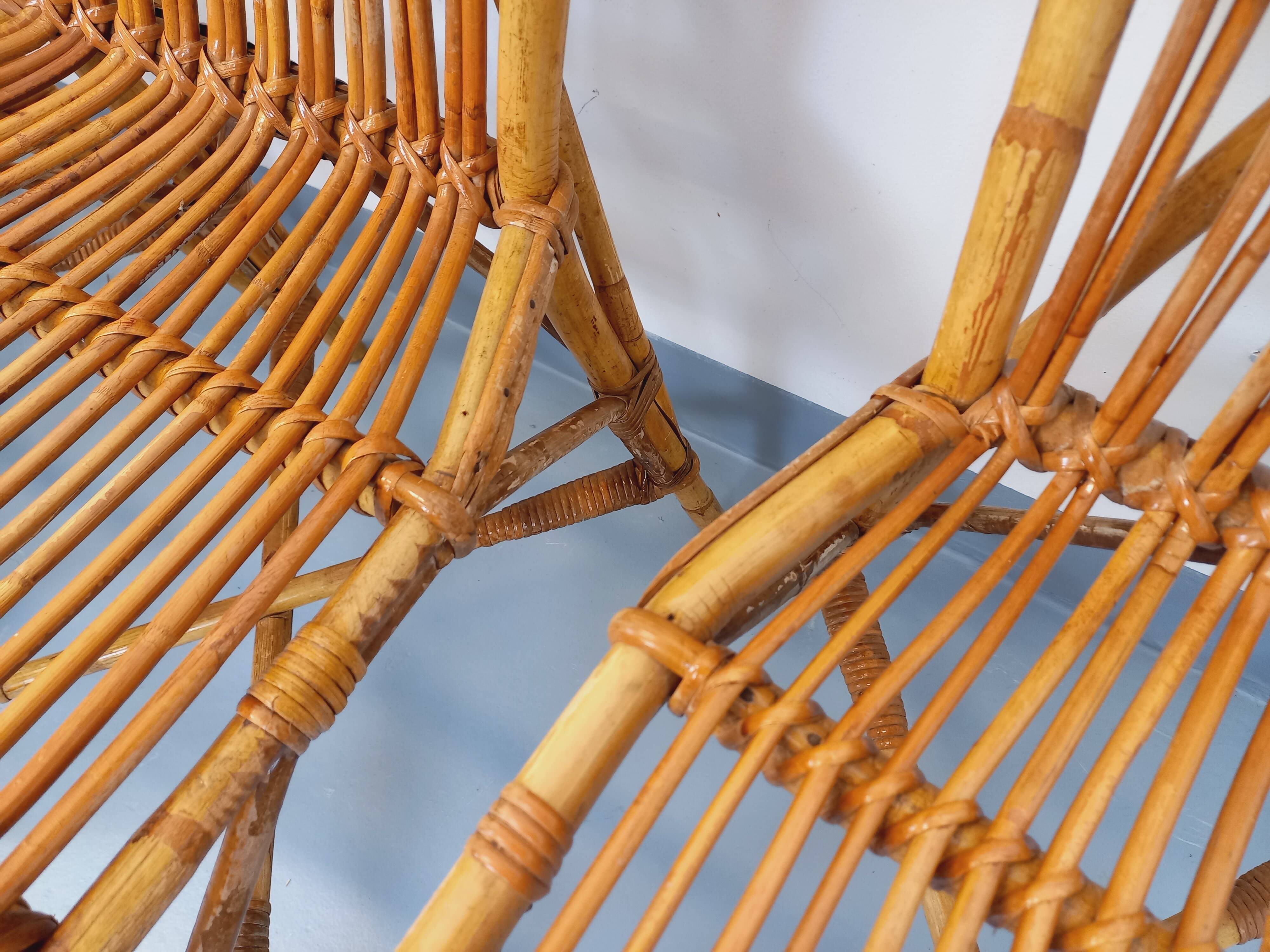 Set of 4 vintage Audoux Minet rattan chairs from the 1950s and 60s.