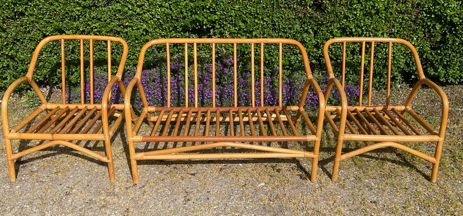 Vintage living room sofa and 2 rattan armchairs.