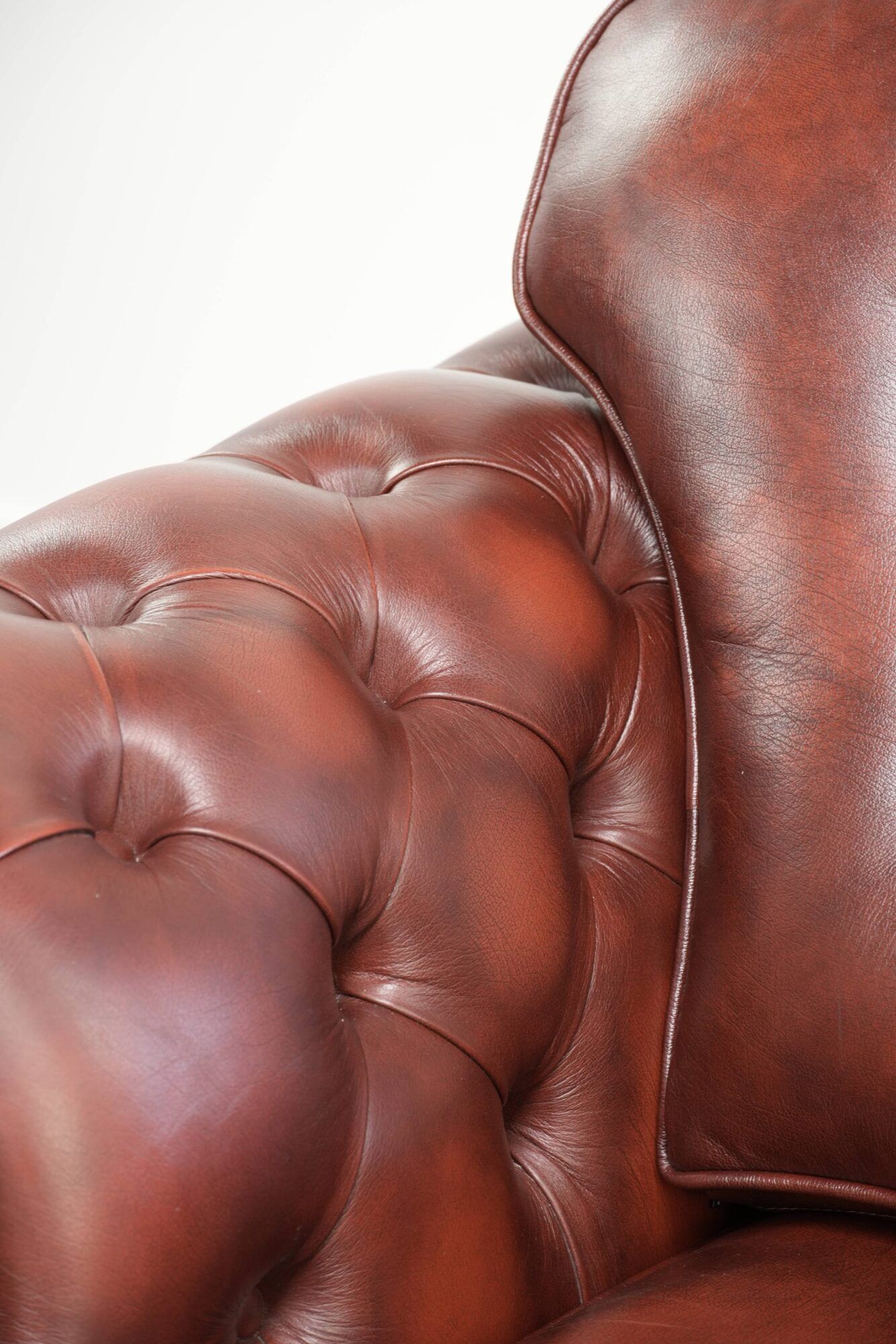Brown cow leather Chesterfield armchair in a unique design