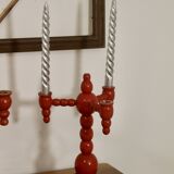 Pair of red wooden candelabra from Sweden 1970