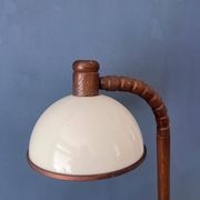 Mid-century floor lamp in brown wood by Steinhauer with an acrylic glass shade.