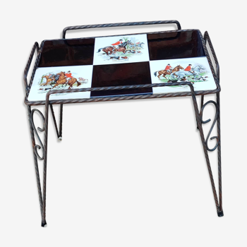 Ceramic side coffee table and wrought iron checkerboard hunting scene