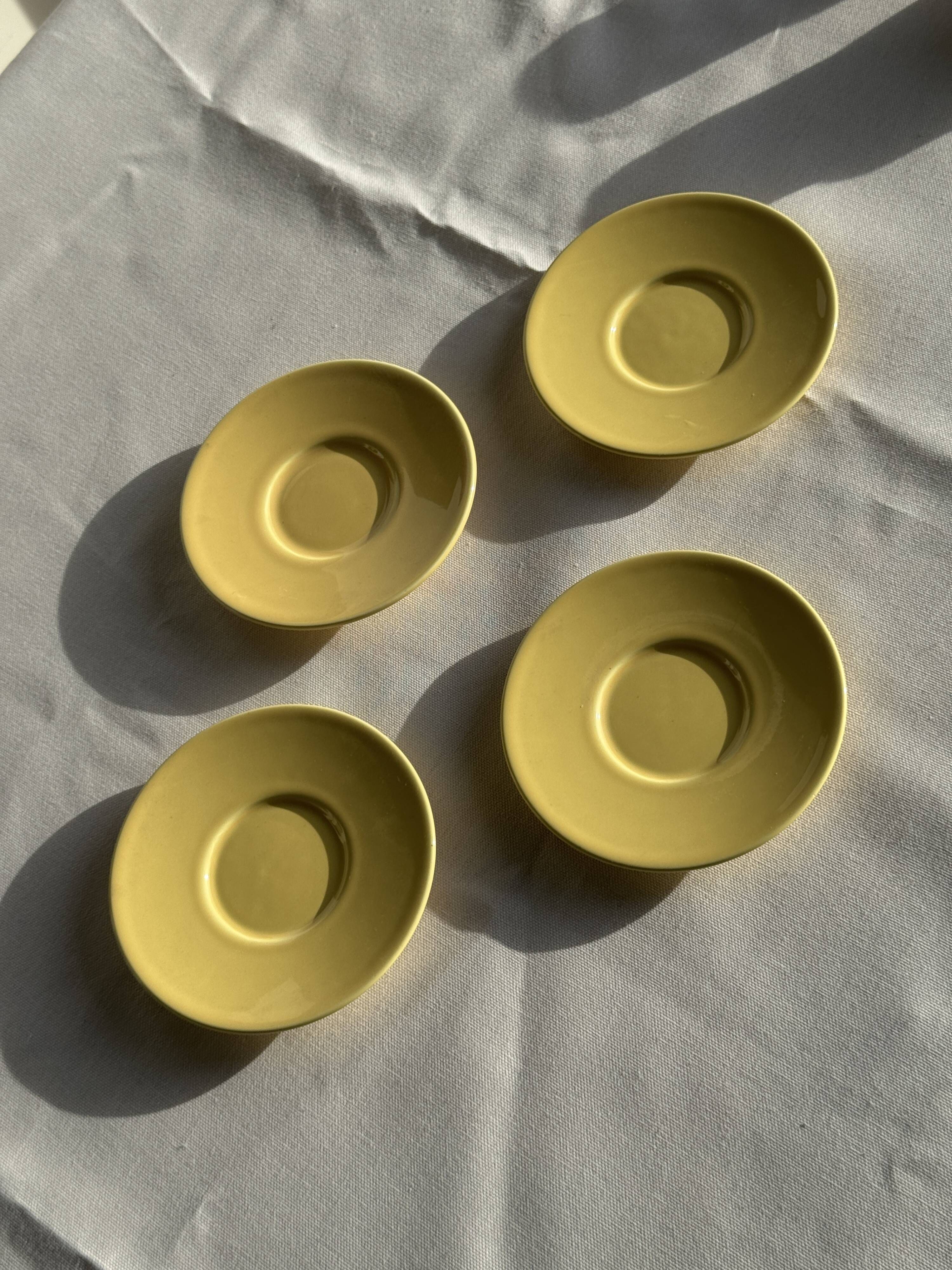 Set of 4 vintage yellow Italian espresso cups and saucers.